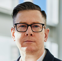 företagsledare, vd-porträtt av Alexander Hughes från ett kryptohandelsföretag